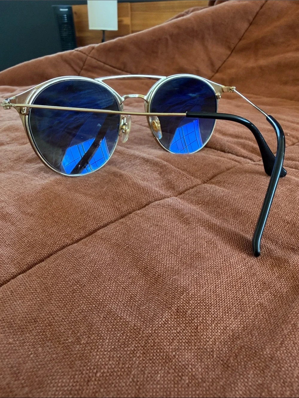 Ray-Ban Black Round Metal Sunglasses with Gold Accent